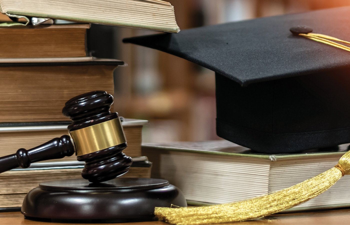 image of books with mortarboard and gavel